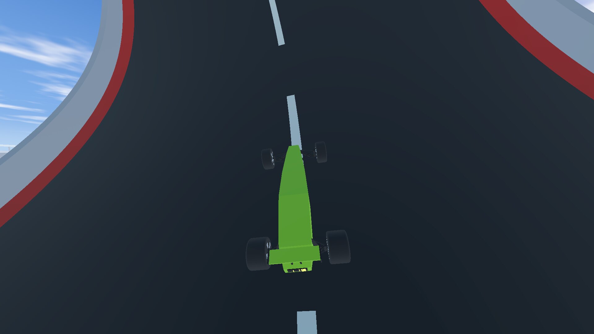 The car upside down at the top of a loop.